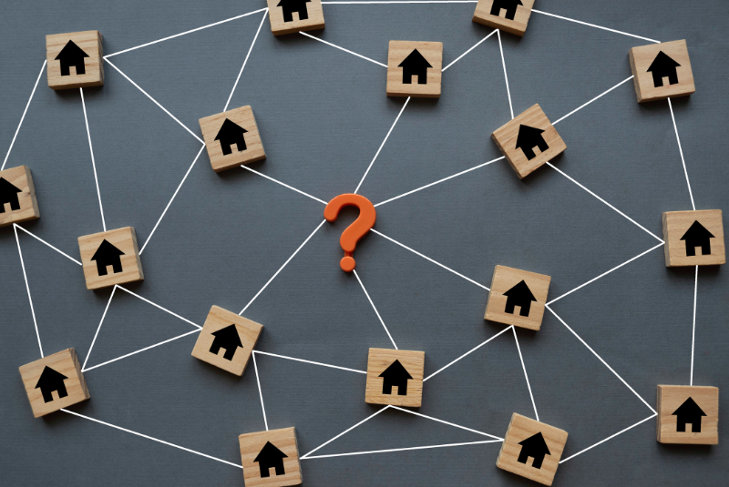 question mark with wood house connected