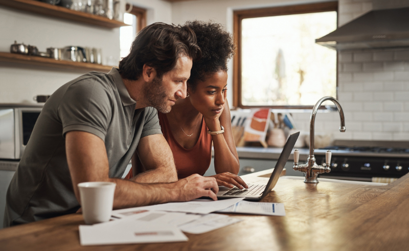 couple looking on the laptop