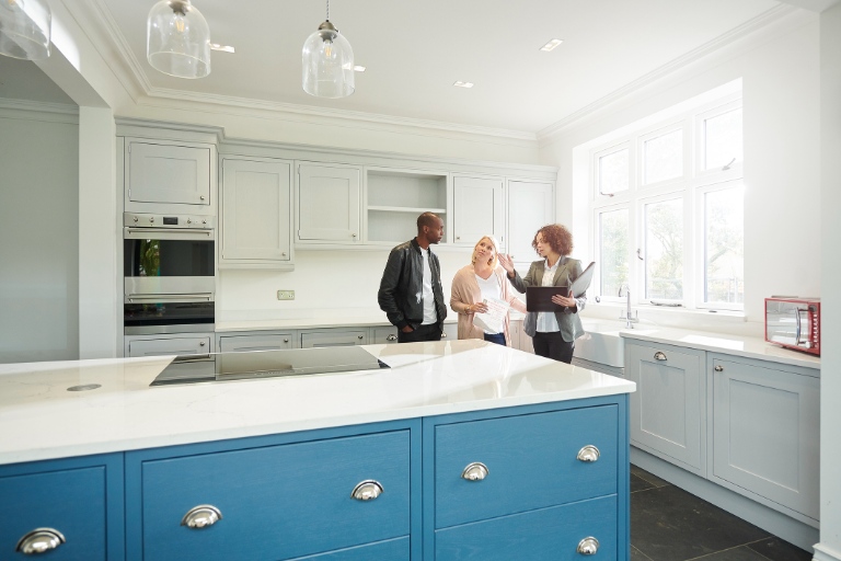 Agent showing kitchen