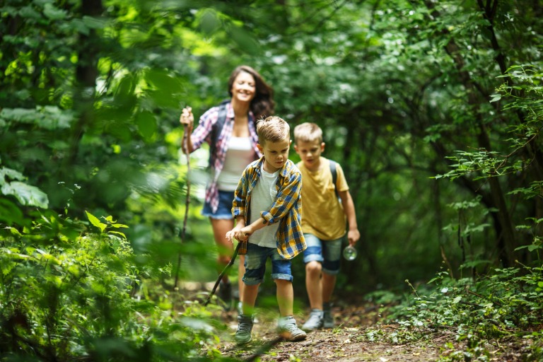 mother and kids hiking